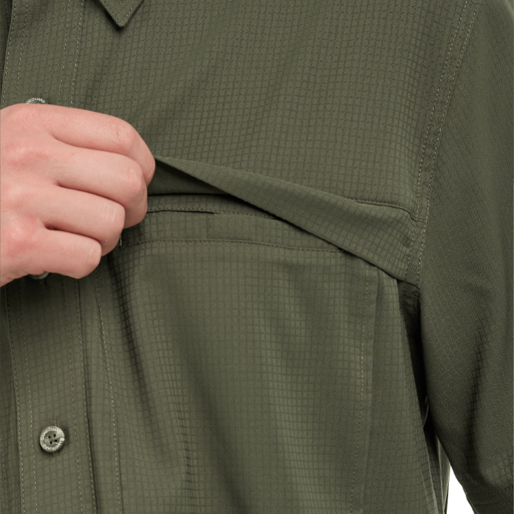 Close-up of a person wearing a green checkered shirt with a buttoned placket.