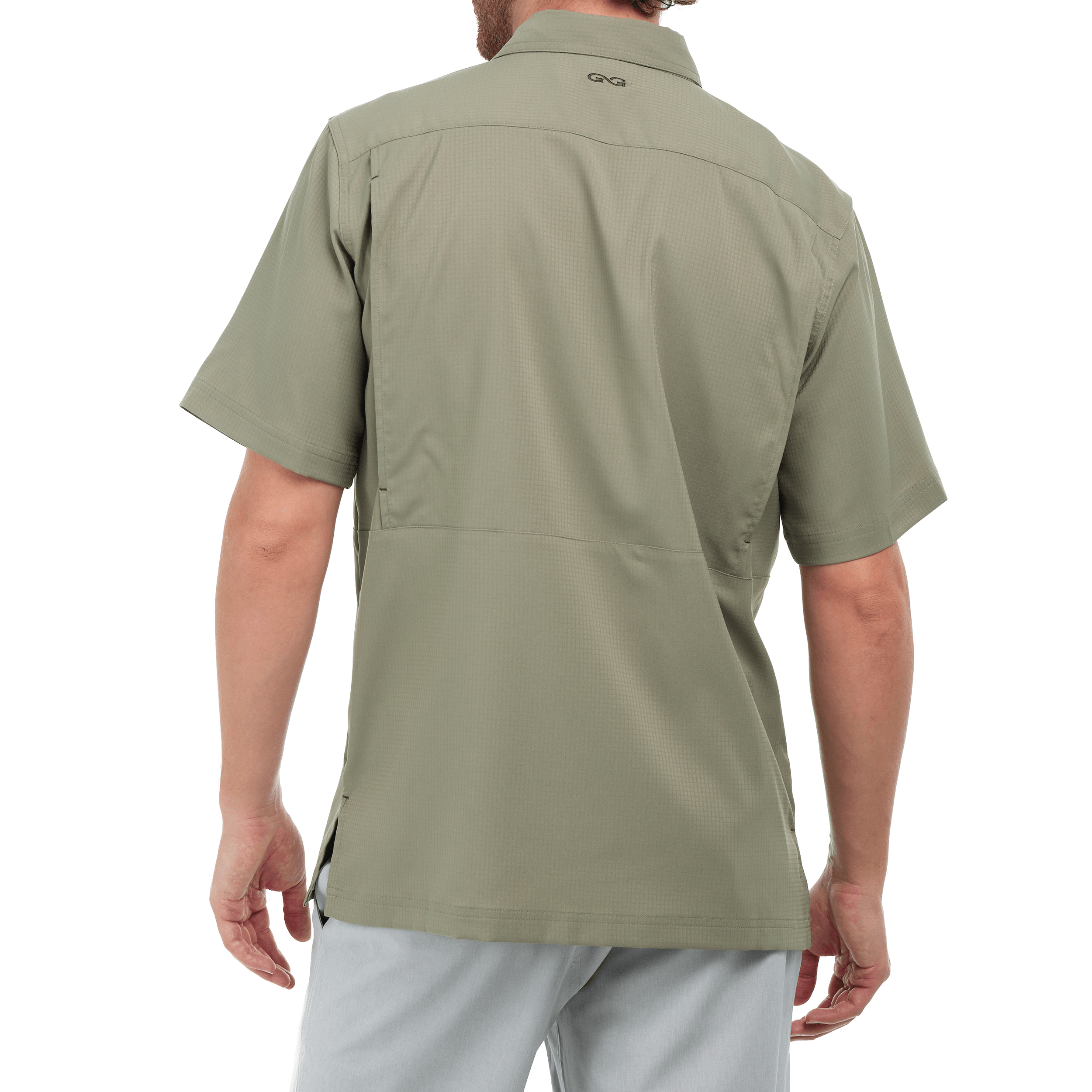 Person wearing a green short-sleeve shirt on a white background