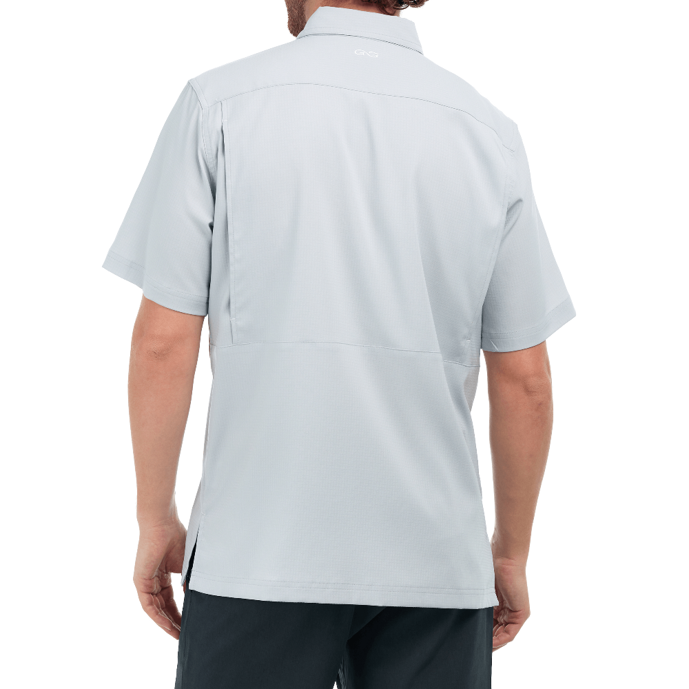 Light gray short-sleeve shirt worn by a person on a white background