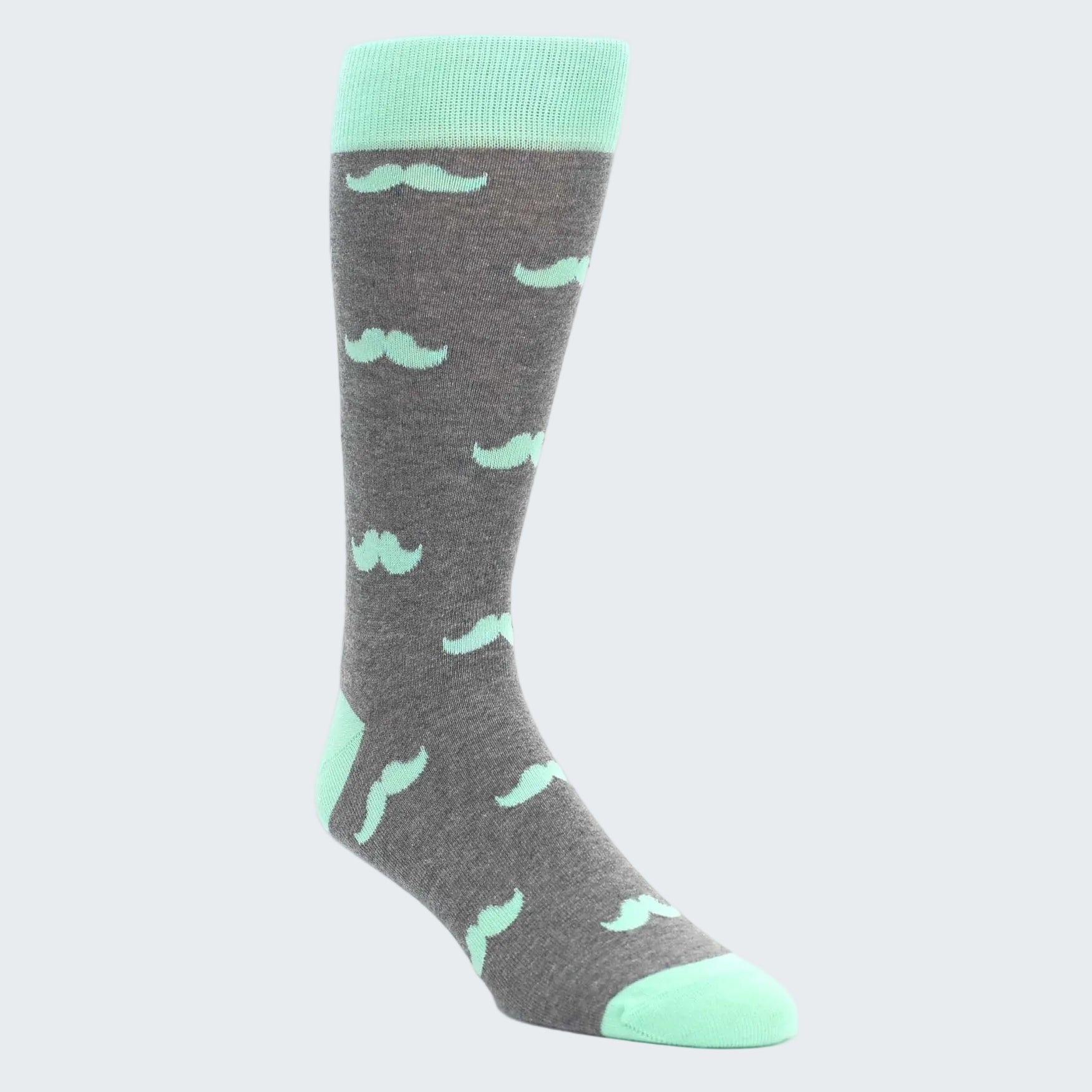 Gray sock with green mustache pattern and green cuff on a white background
