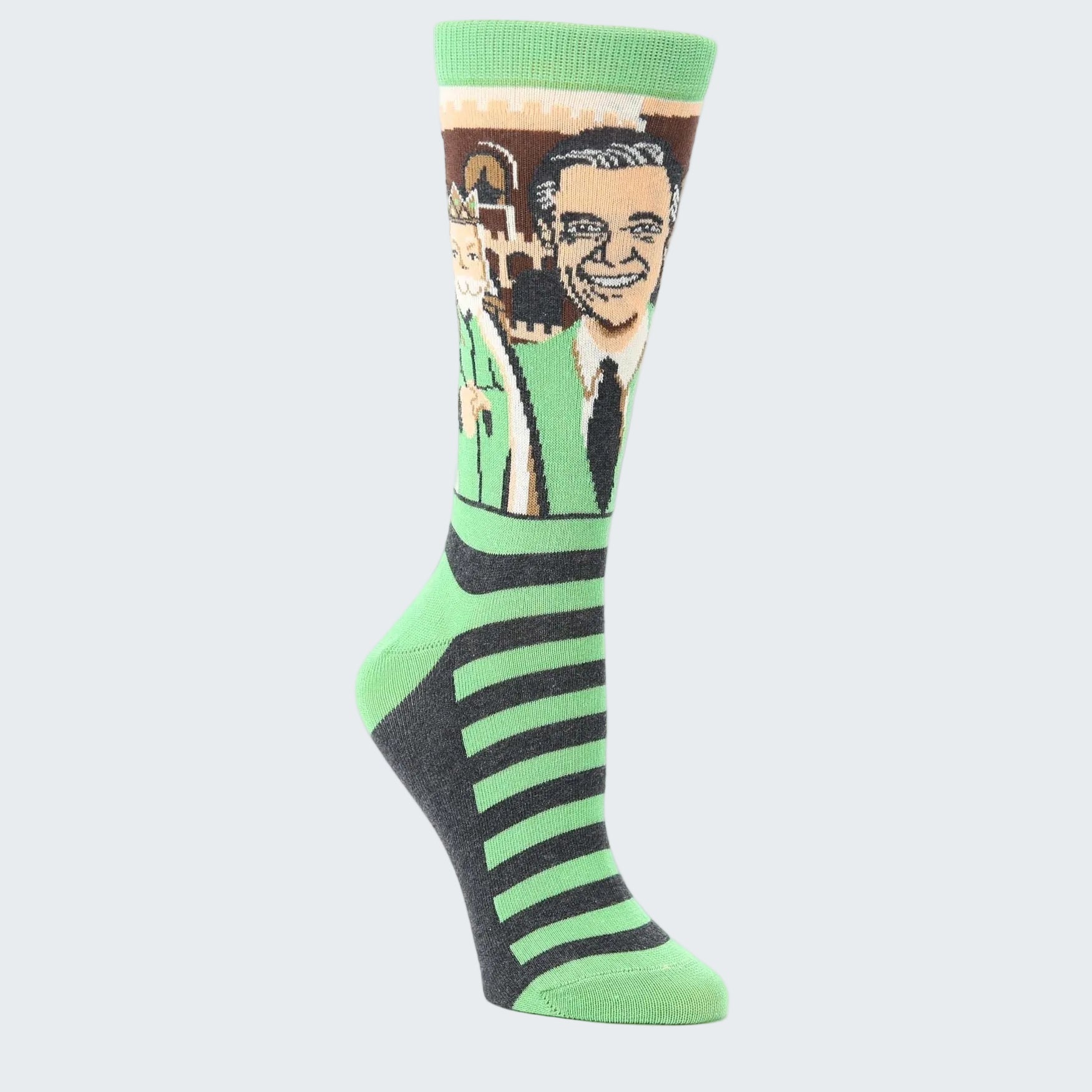 Socks with a graphic of a smiling man and green and black striped pattern on a white background