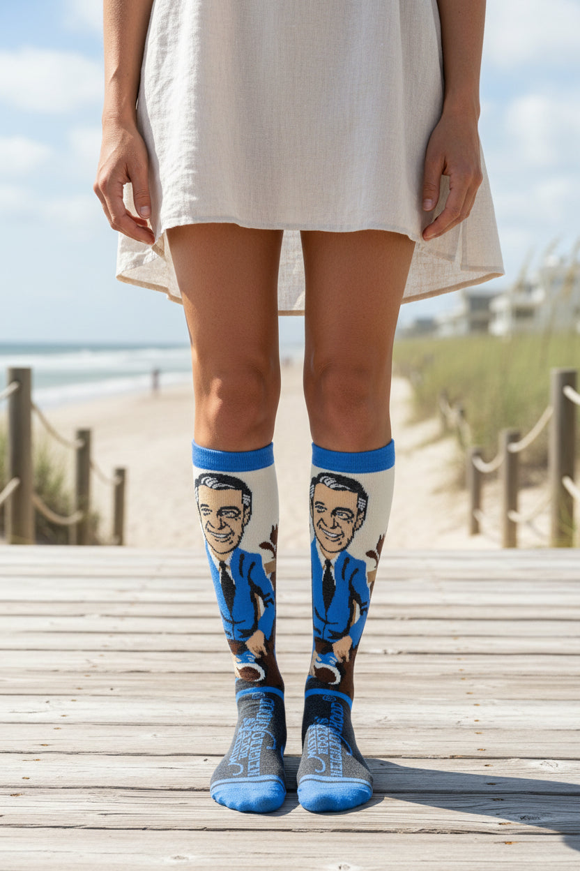 Sock with a graphic of a man in a suit and tie on a white background