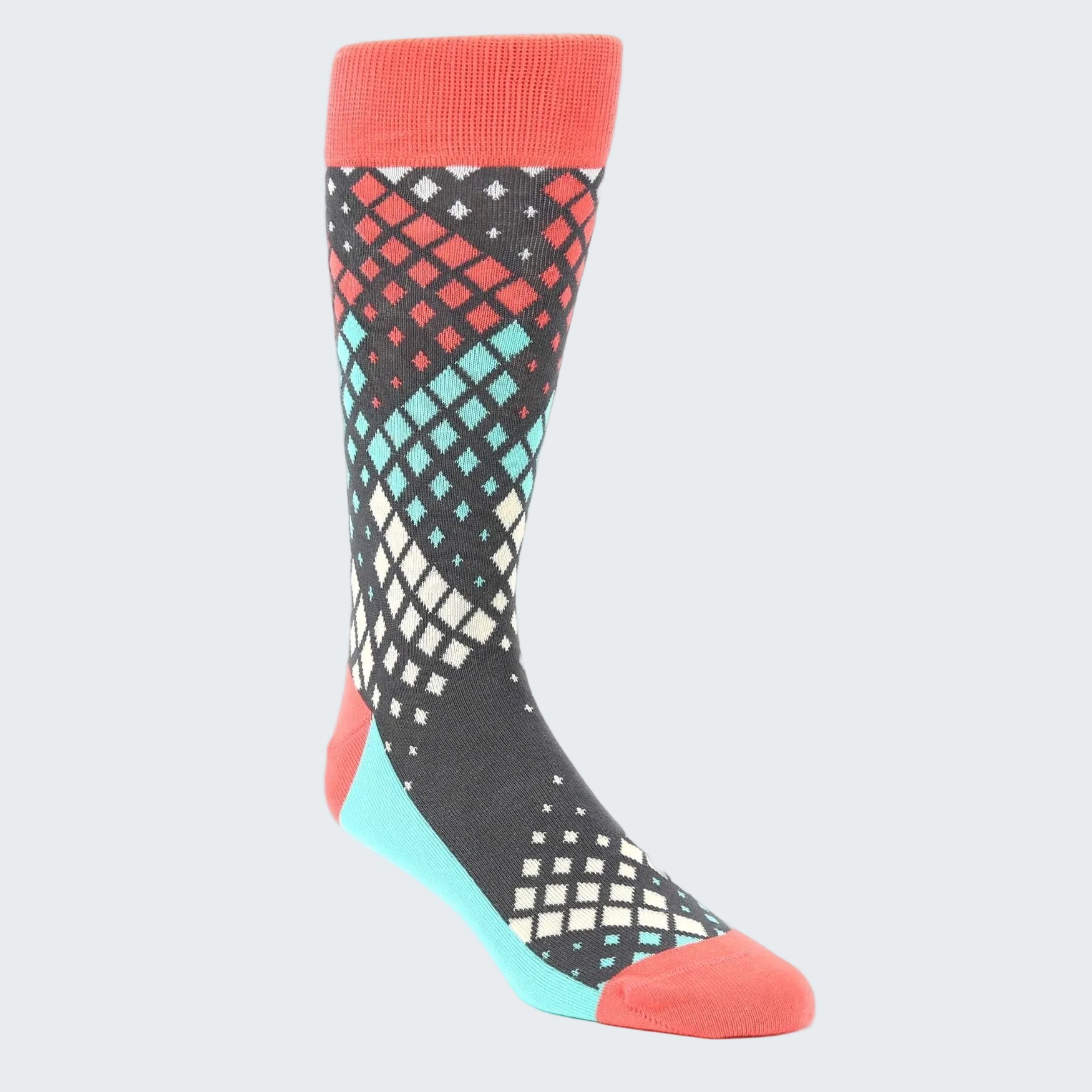 Colorful patterned sock with red, black, and blue design on a white background