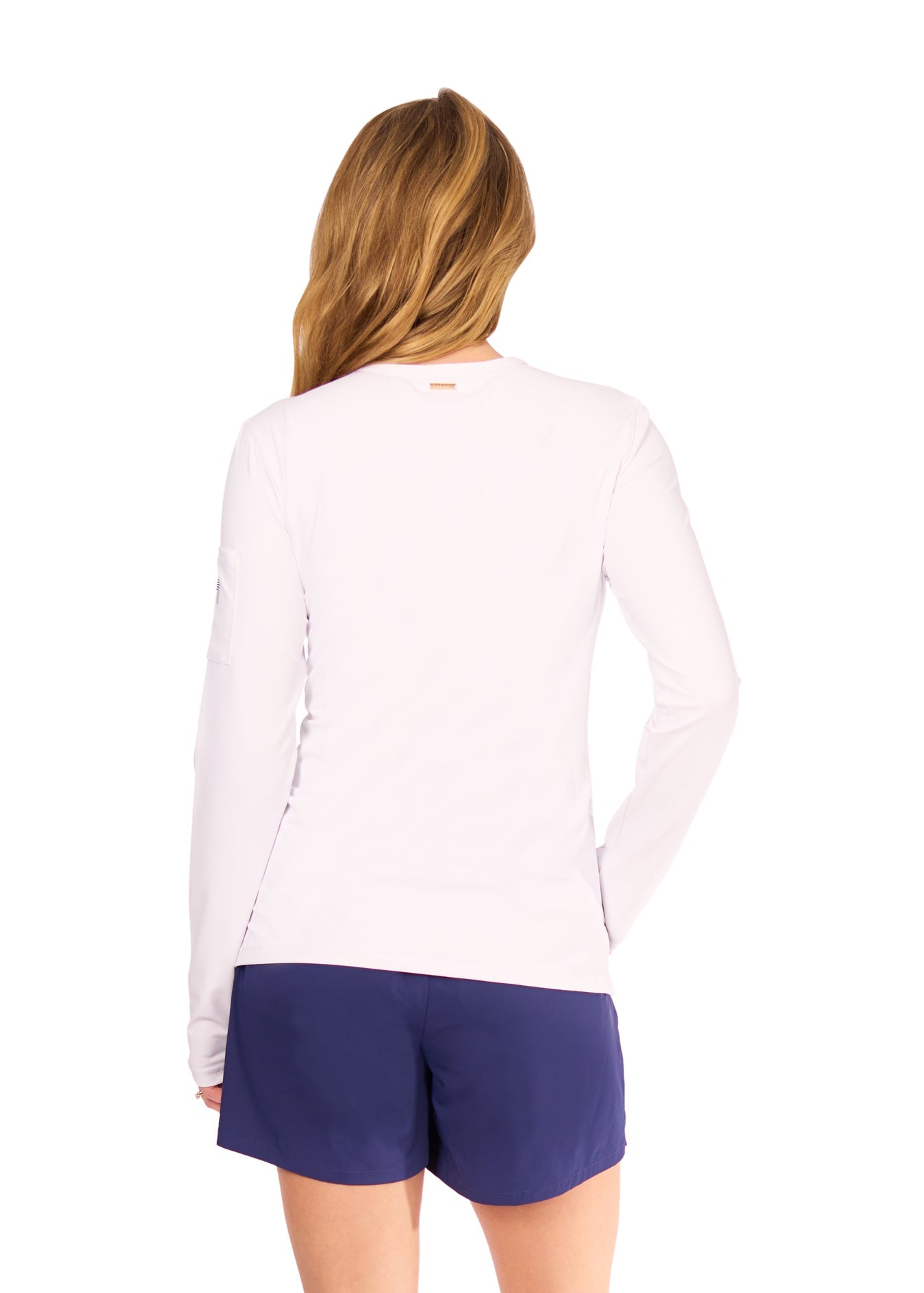 Person wearing a white long-sleeve shirt and blue shorts on a white background
