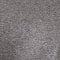 A close-up texture shot of a gray and white speckled material, resembling concrete, stone, or a textured concrete-look tile.