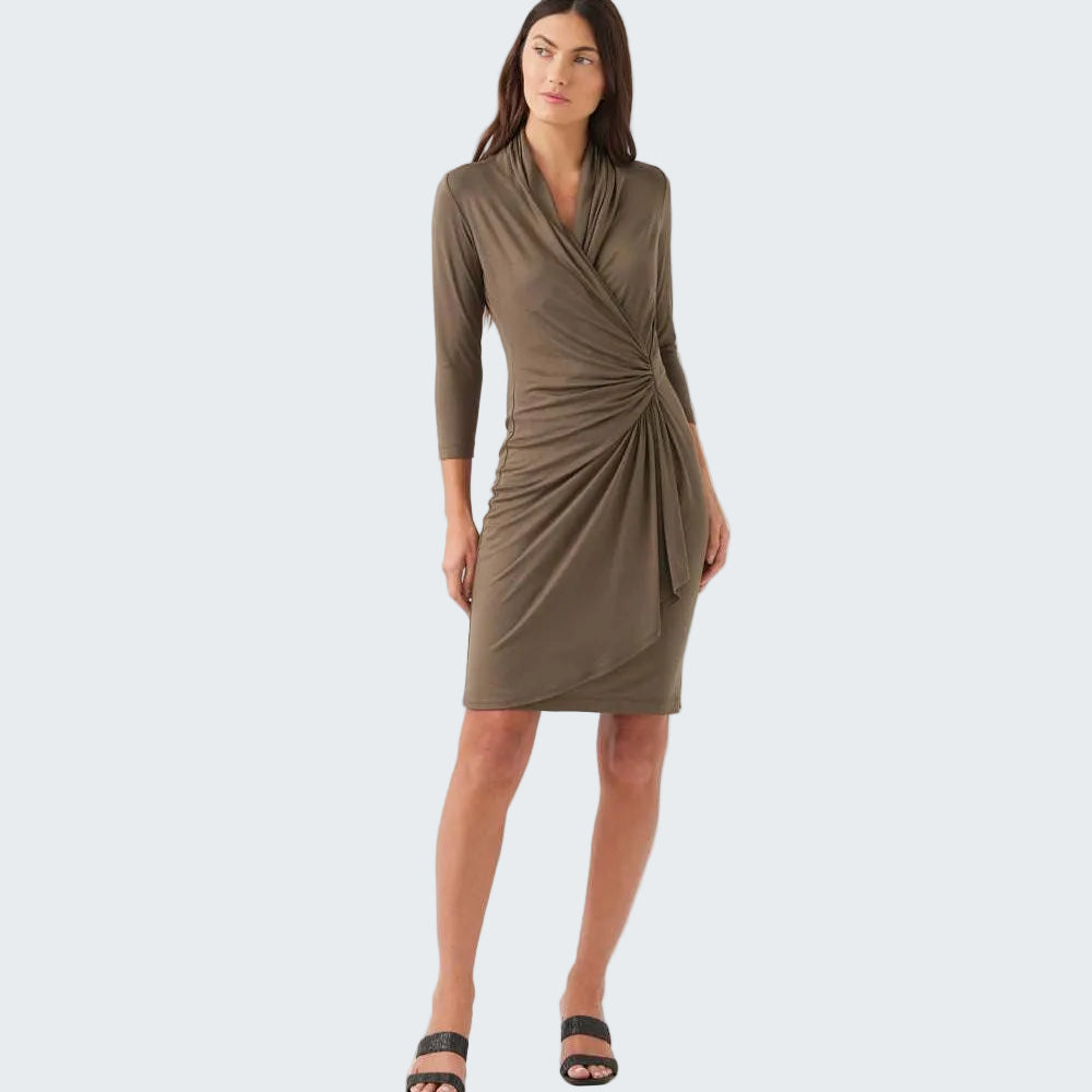 Woman wearing a brown dress on a white background