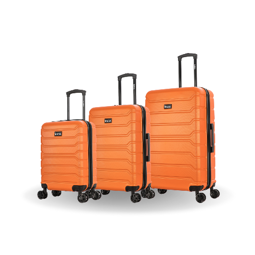 Set of three orange suitcases of different sizes on a white background