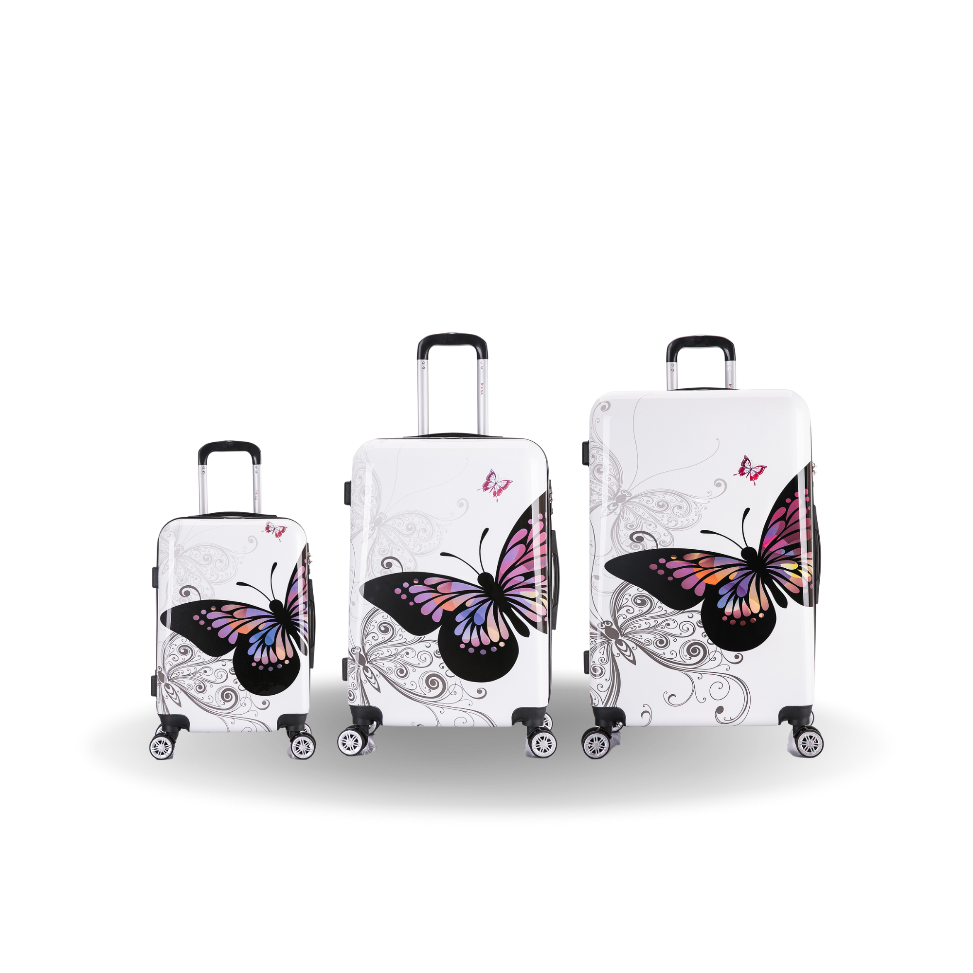 Set of three suitcases with butterfly designs on a white background
