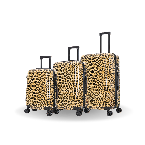 Set of three leopard print suitcases on a white background
