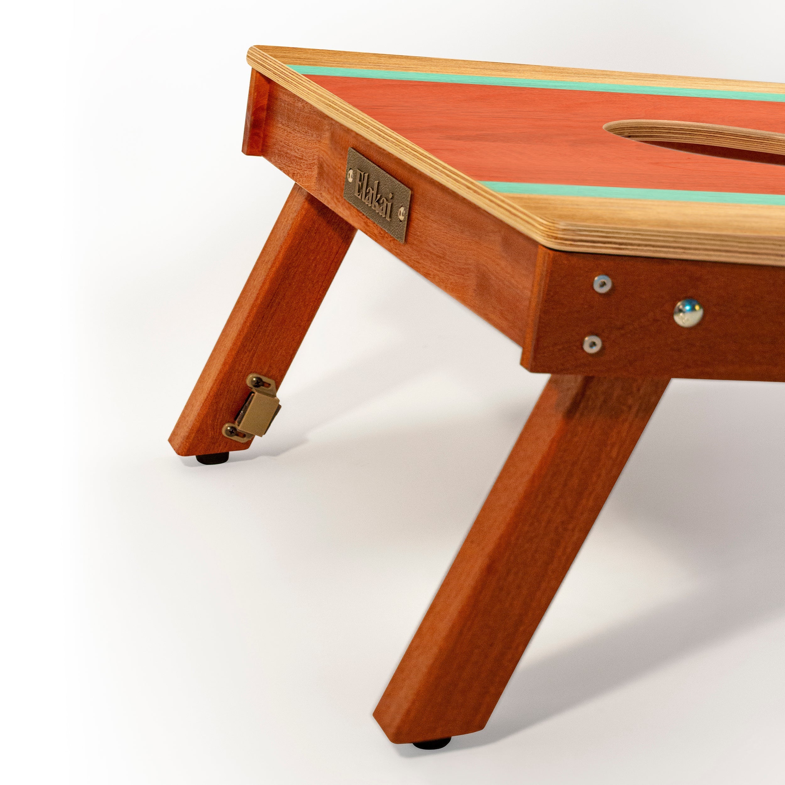 Wooden children's table with a visible brand label on a white background
