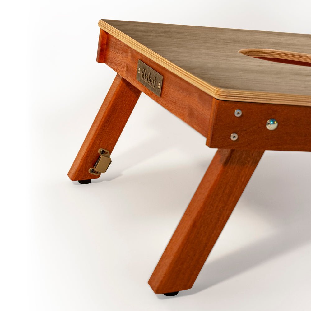Wooden pet bed with a brand label on a white background