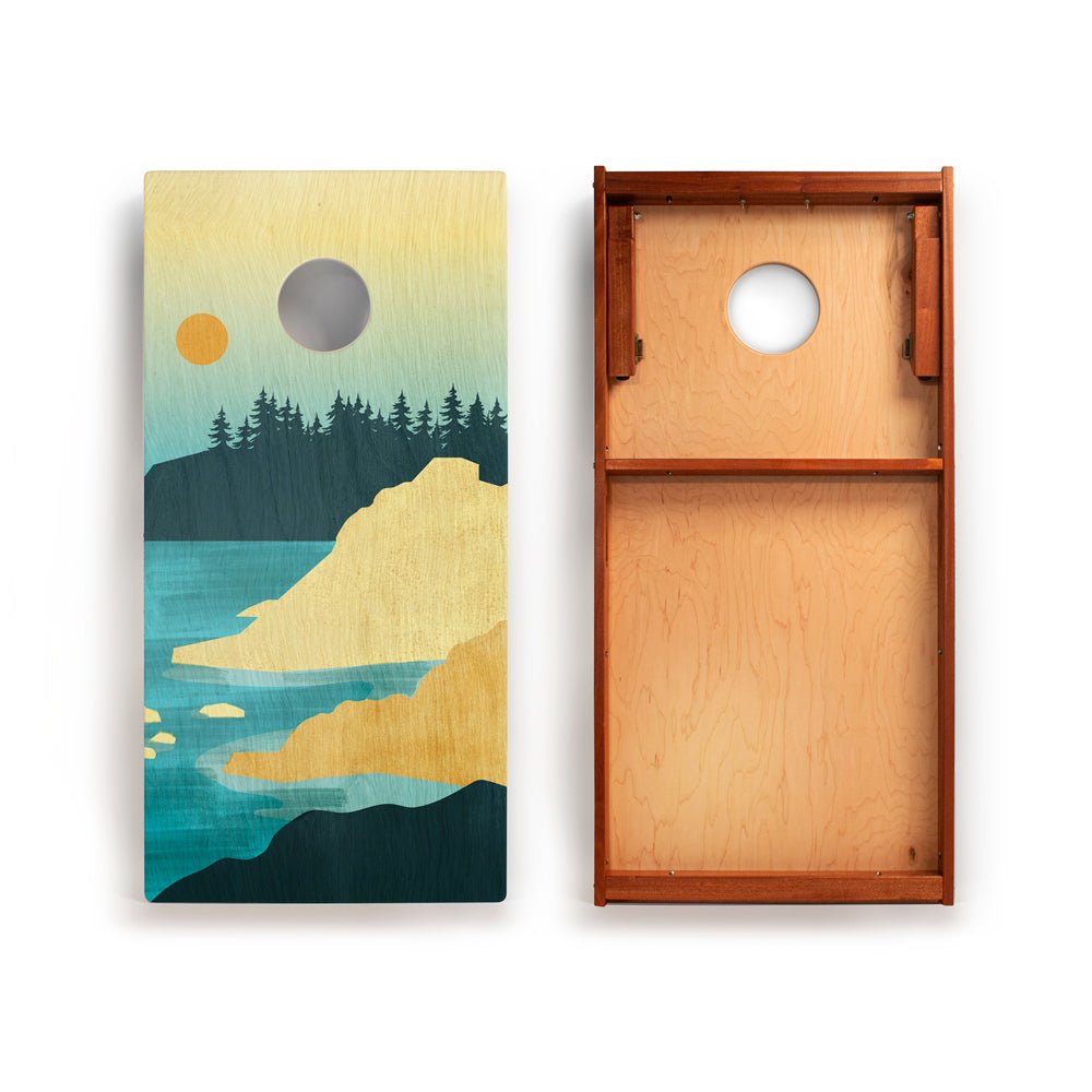 Wooden cornhole board with nature-themed design on one side and plain wood on the other.