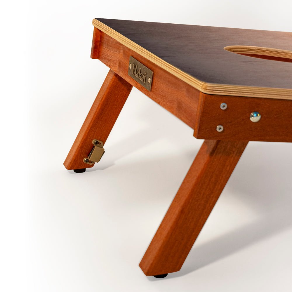 Wooden pet bed with a brand label on a white background