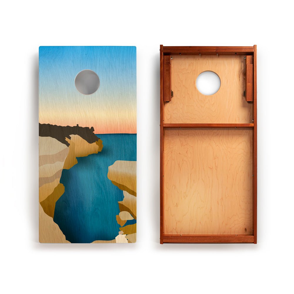 Wooden cornhole board with beach scene design on one side and plain wood on the other