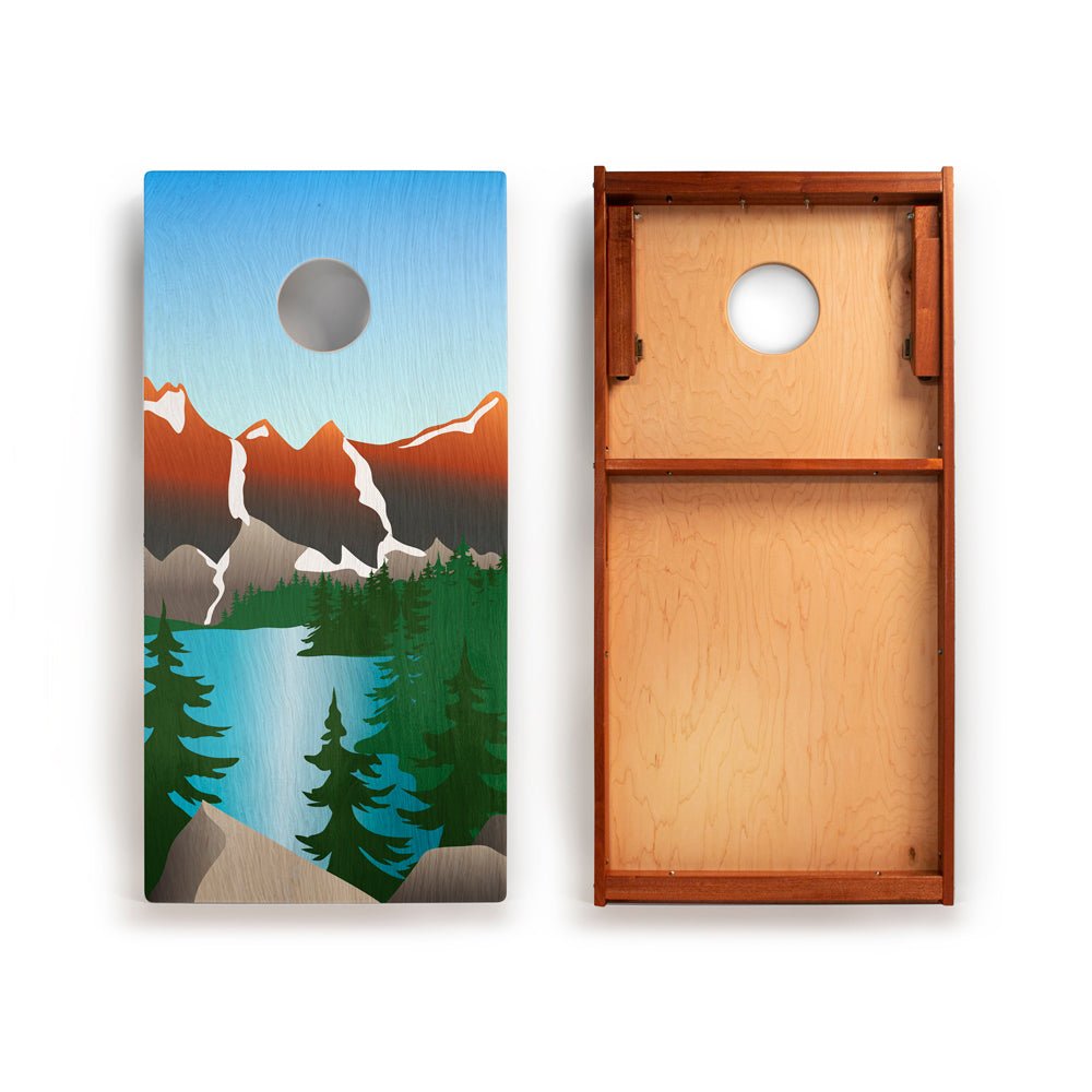 Cornhole board with nature-themed design on one side and plain wood on the other