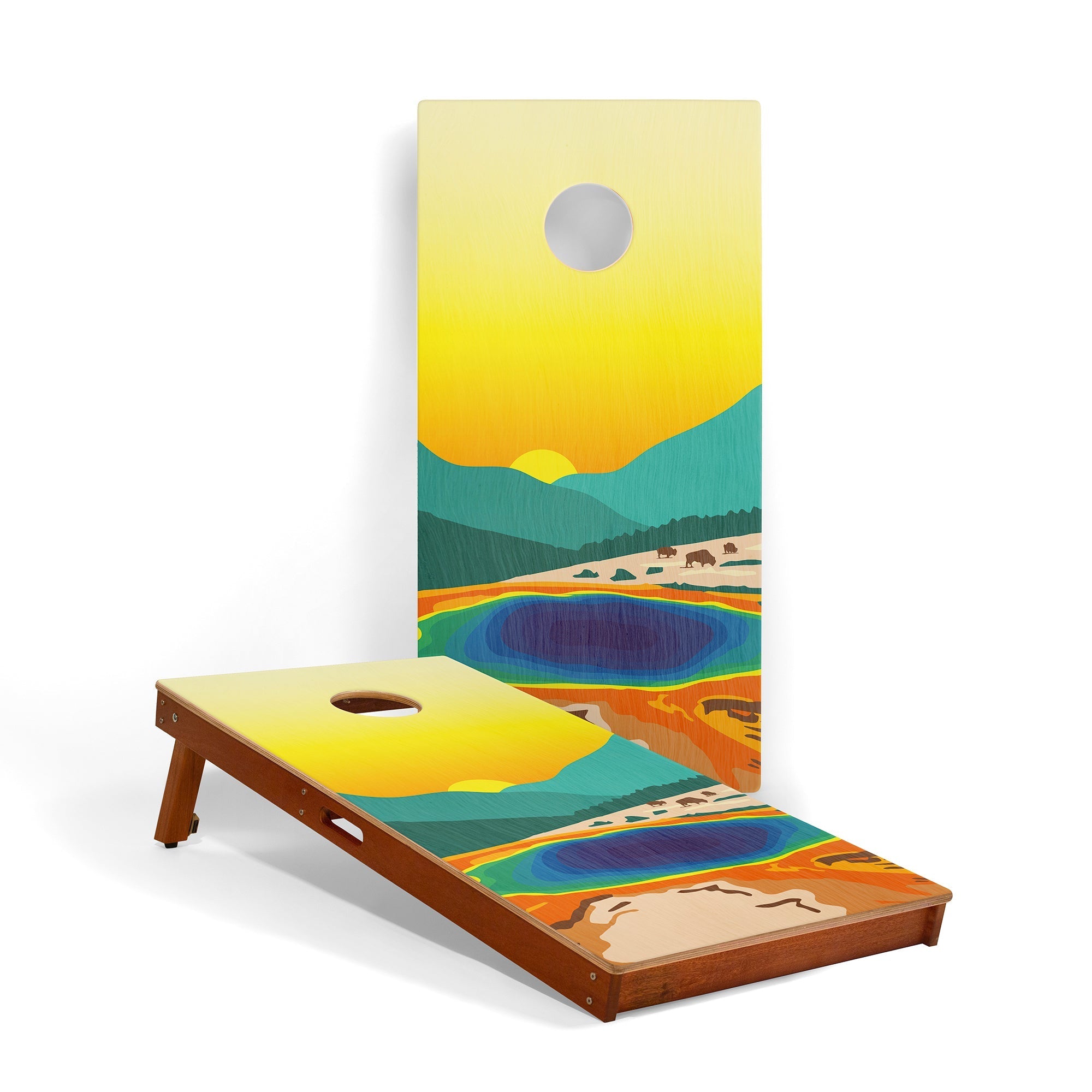 Cornhole board with a scenic design of a lake and mountains on a white background