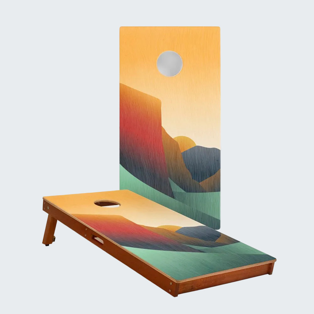 Cornhole board with colorful mountain design on a white background