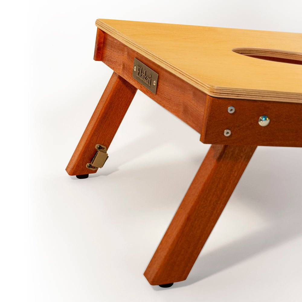 Wooden pet play table with a visible brand label on a white background