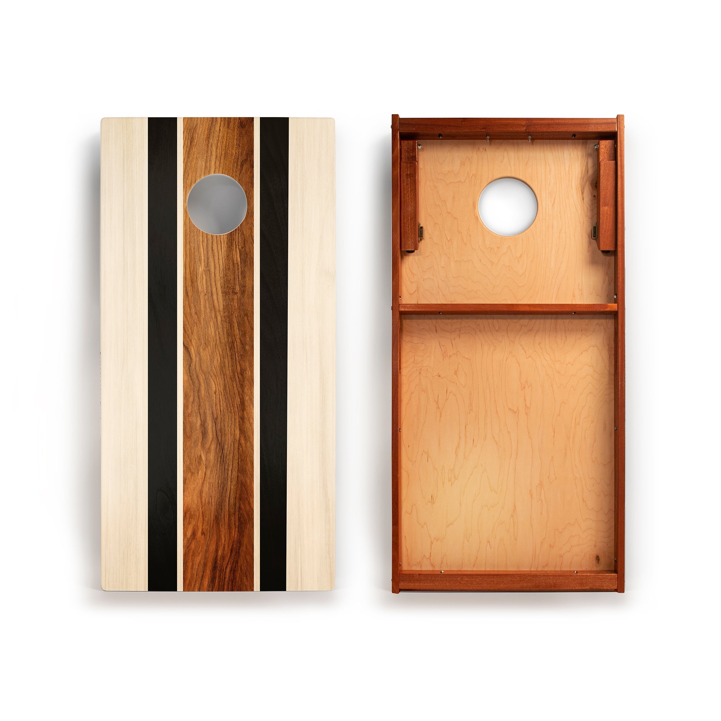 Wooden cornhole boards with striped design on a white background