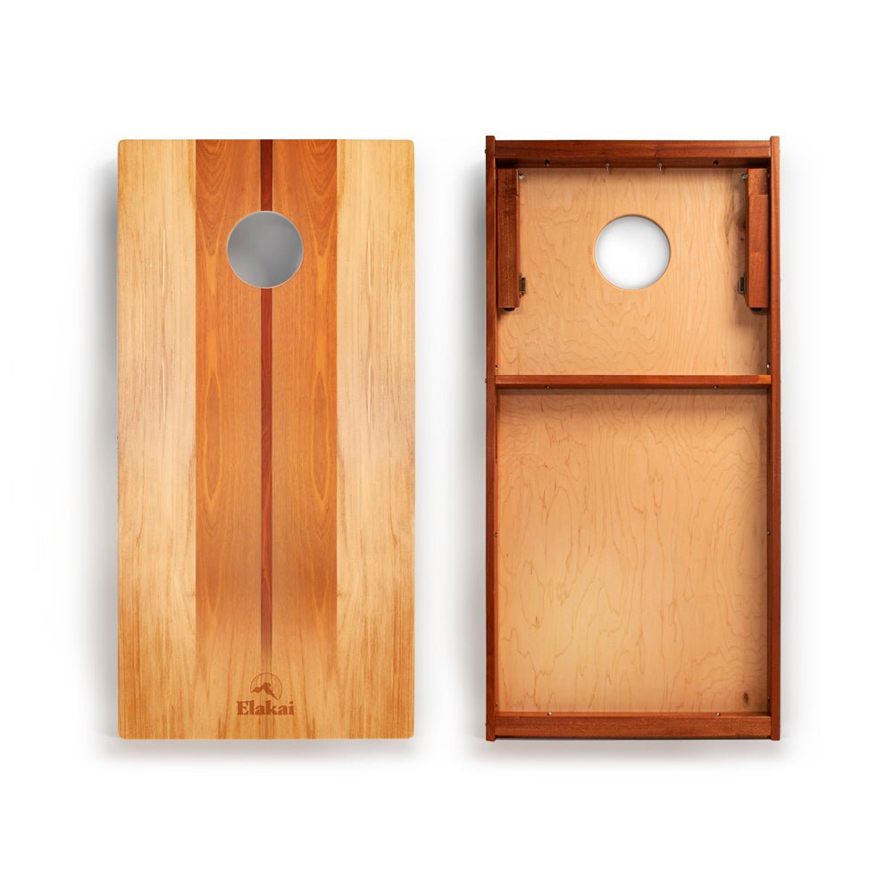 Wooden cornhole boards with Elakat branding on a white background