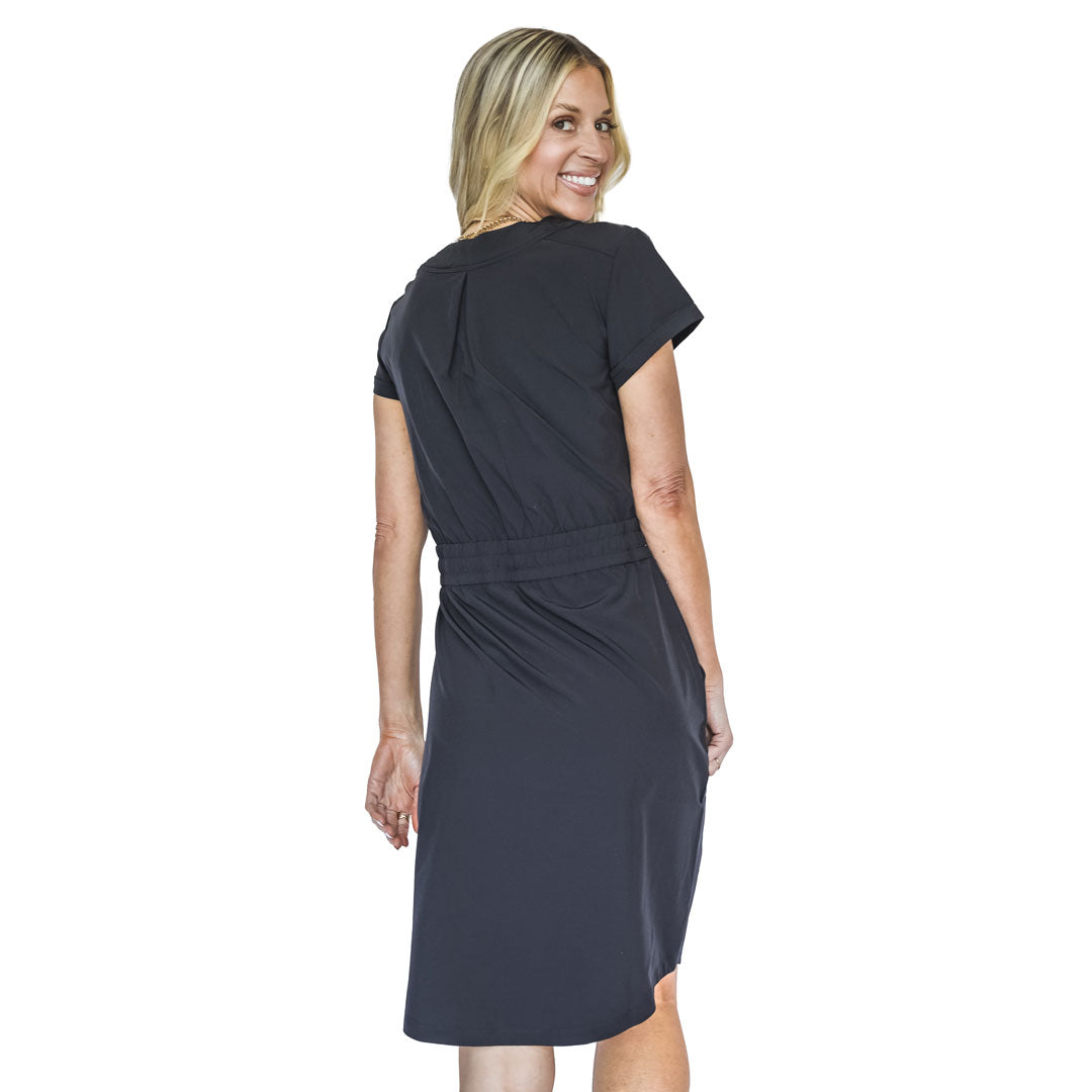 Woman wearing a black dress on a white background