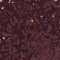 A close-up texture shot of a dark purple fabric with fine glittery or sparkly flecks throughout.