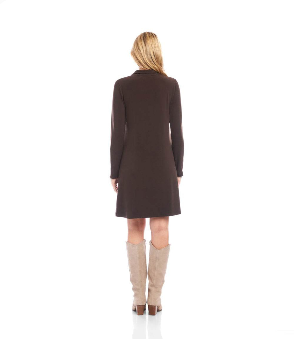 A woman viewed from the back wearing a dark brown long-sleeve knee-length dress and beige knee-high boots against a plain white background.