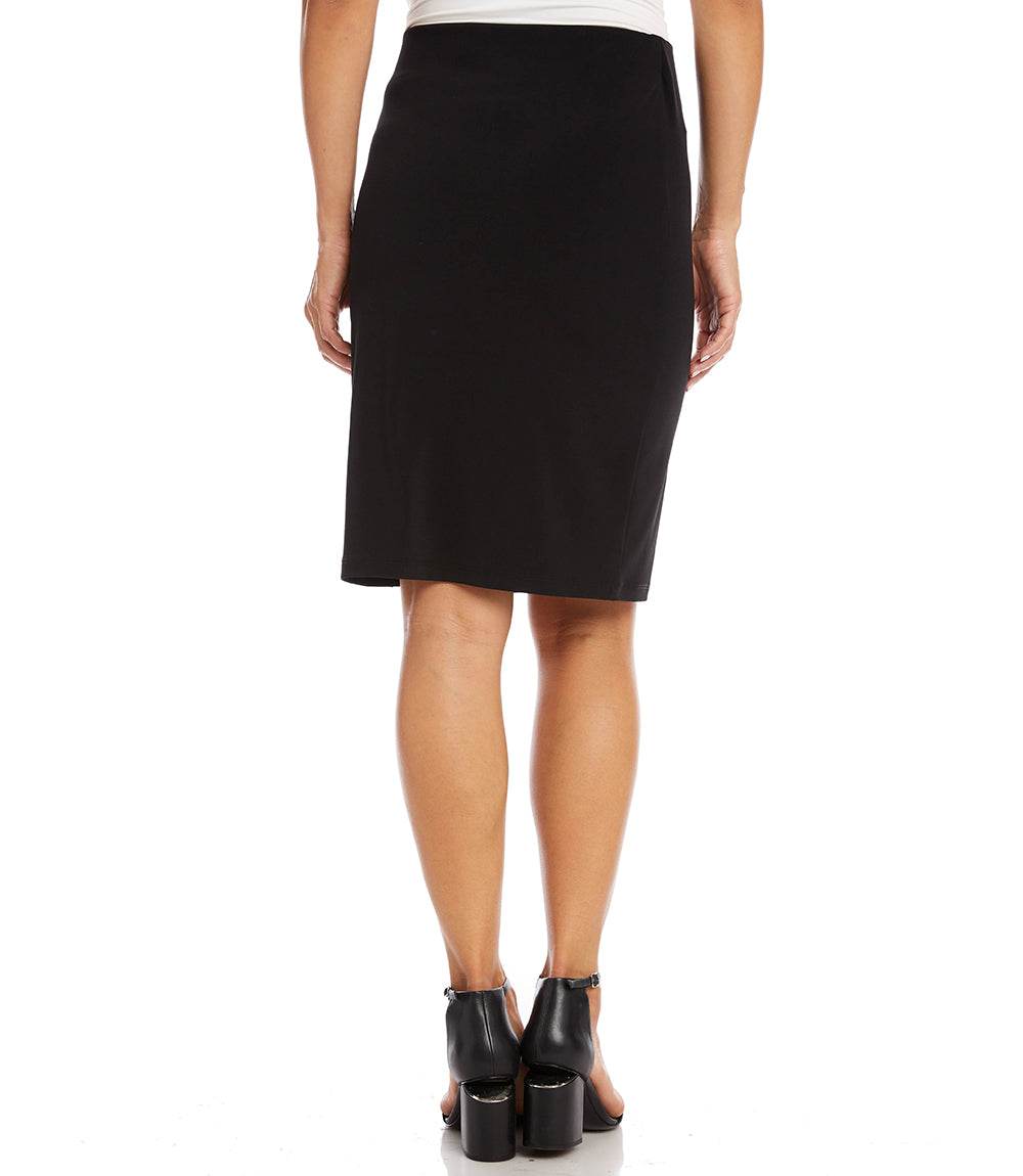 Person wearing a black skirt on a white background