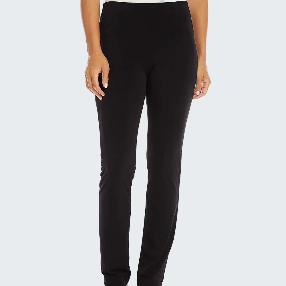 Black ankle-length pants shown on a model against a plain white studio background. The model is cropped from the chest down and wears black slide sandals.