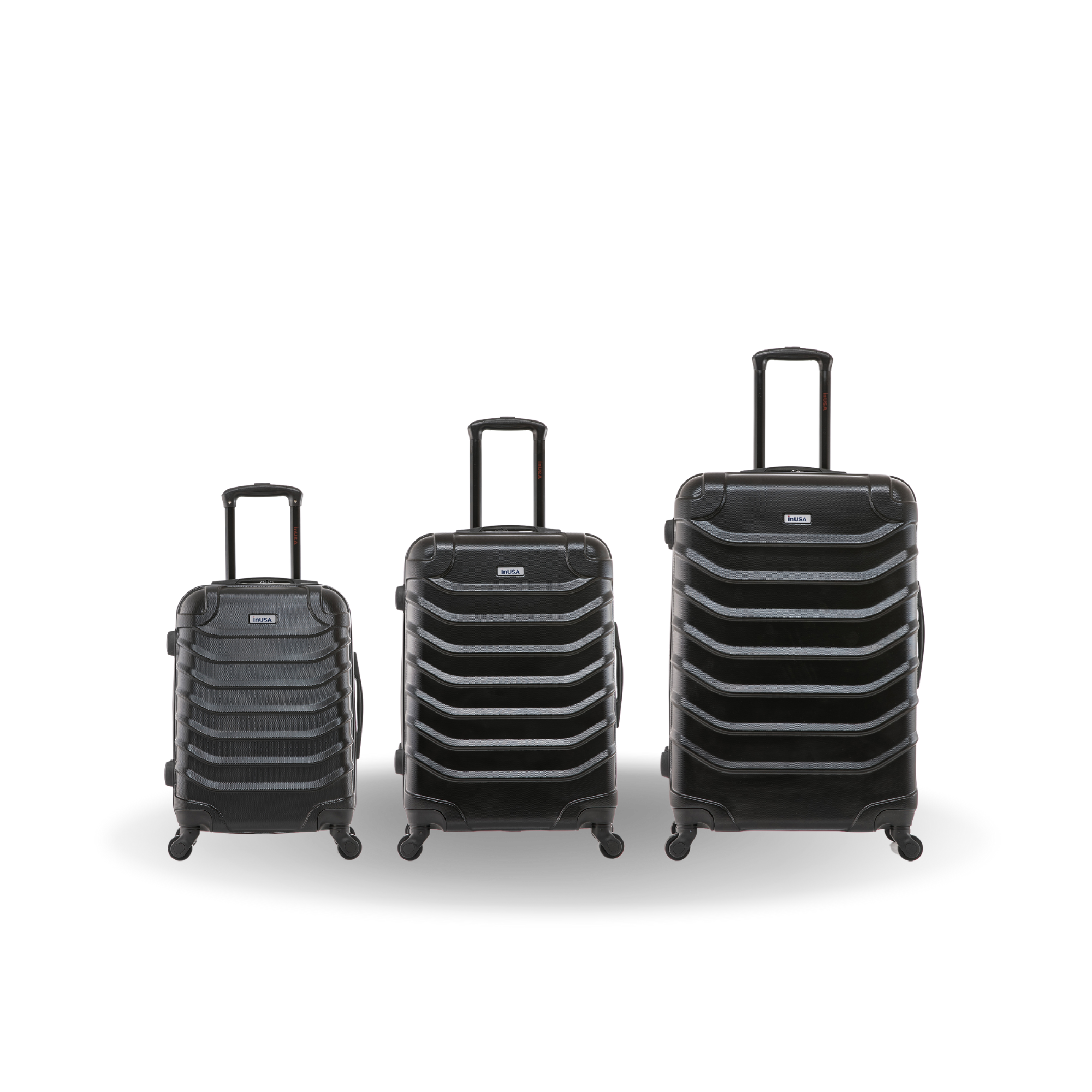Three black suitcases of different sizes on a white background