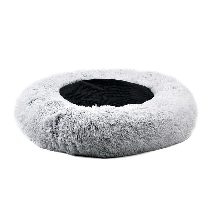 Gray fluffy pet bed on a white background