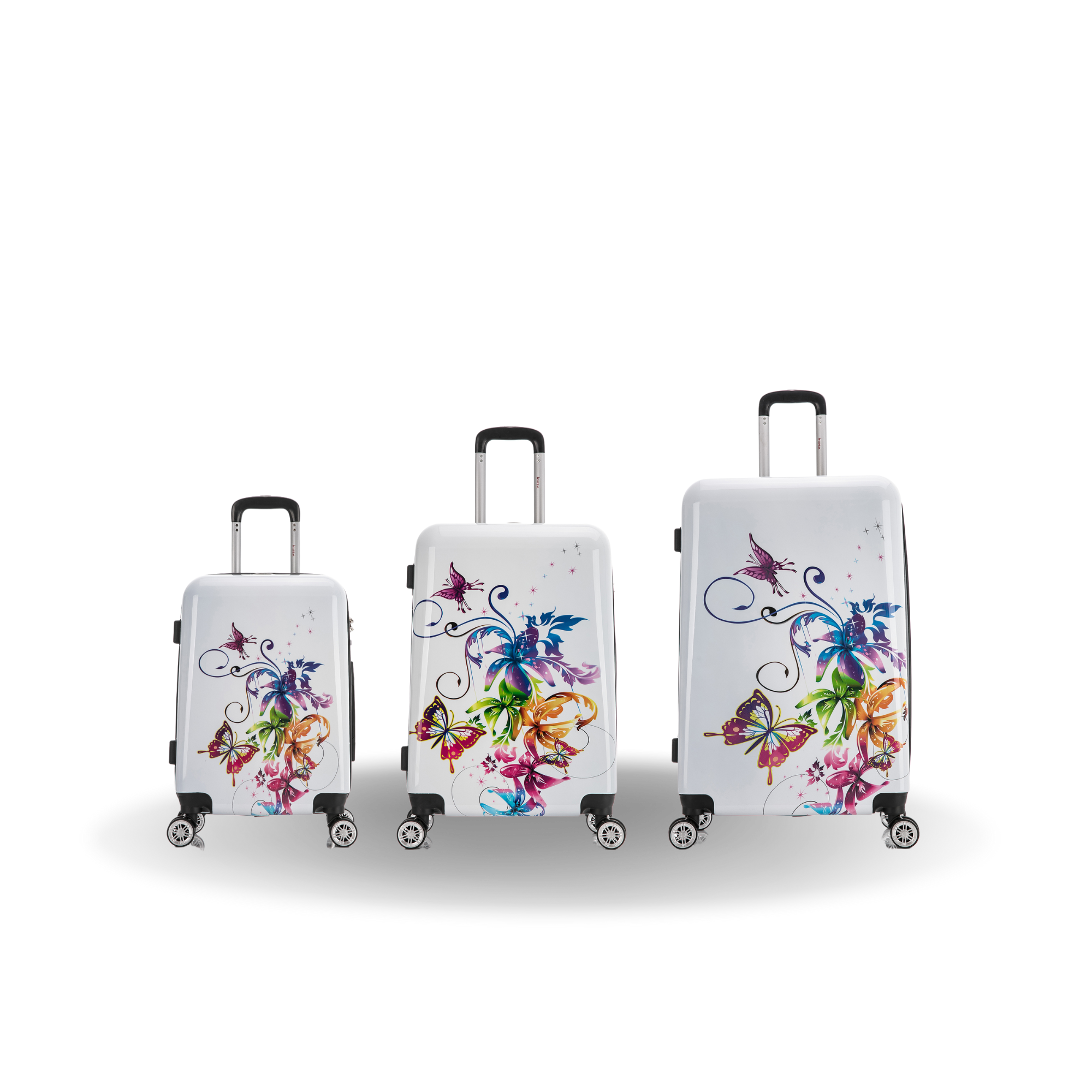 Three suitcases with colorful butterfly designs on a white background