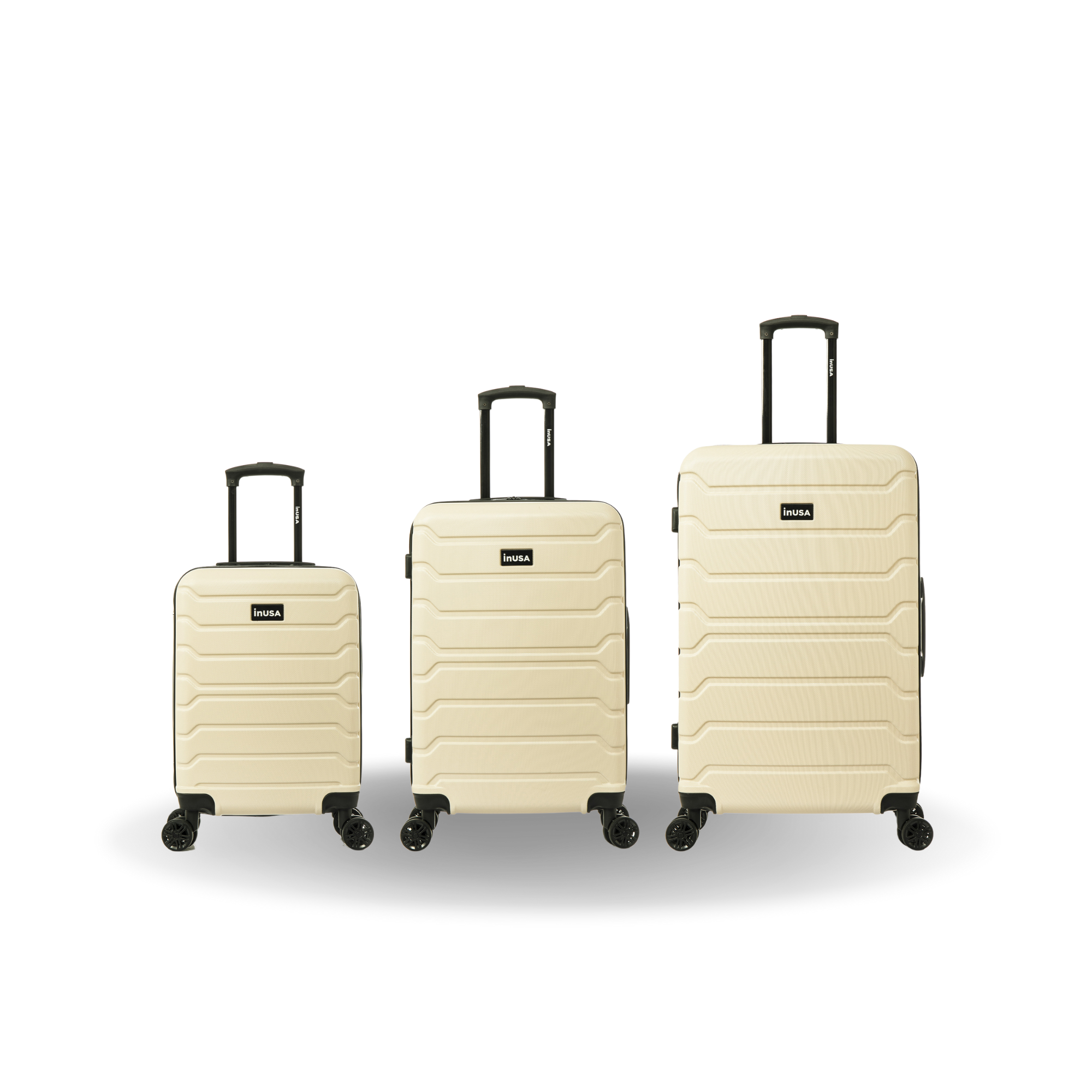 Three beige suitcases of different sizes on a white background