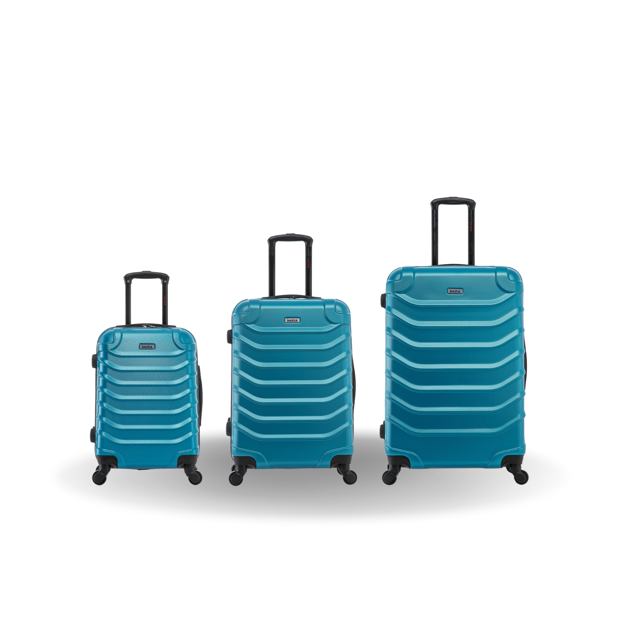 Three blue suitcases of different sizes on a white background