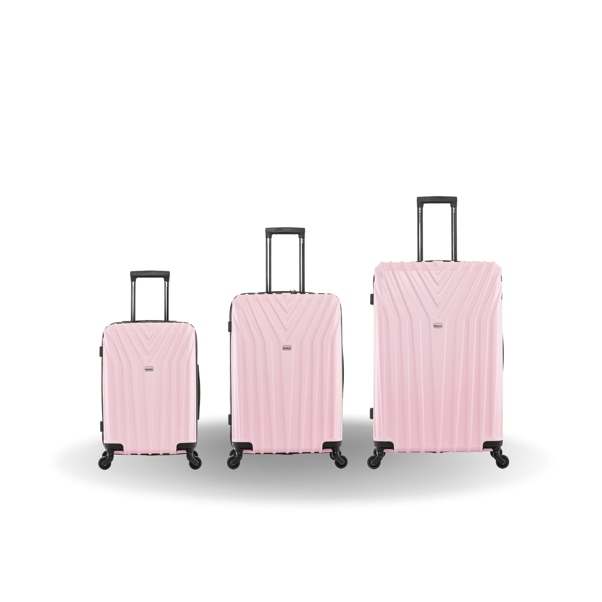 Three pink suitcases of different sizes on a white background