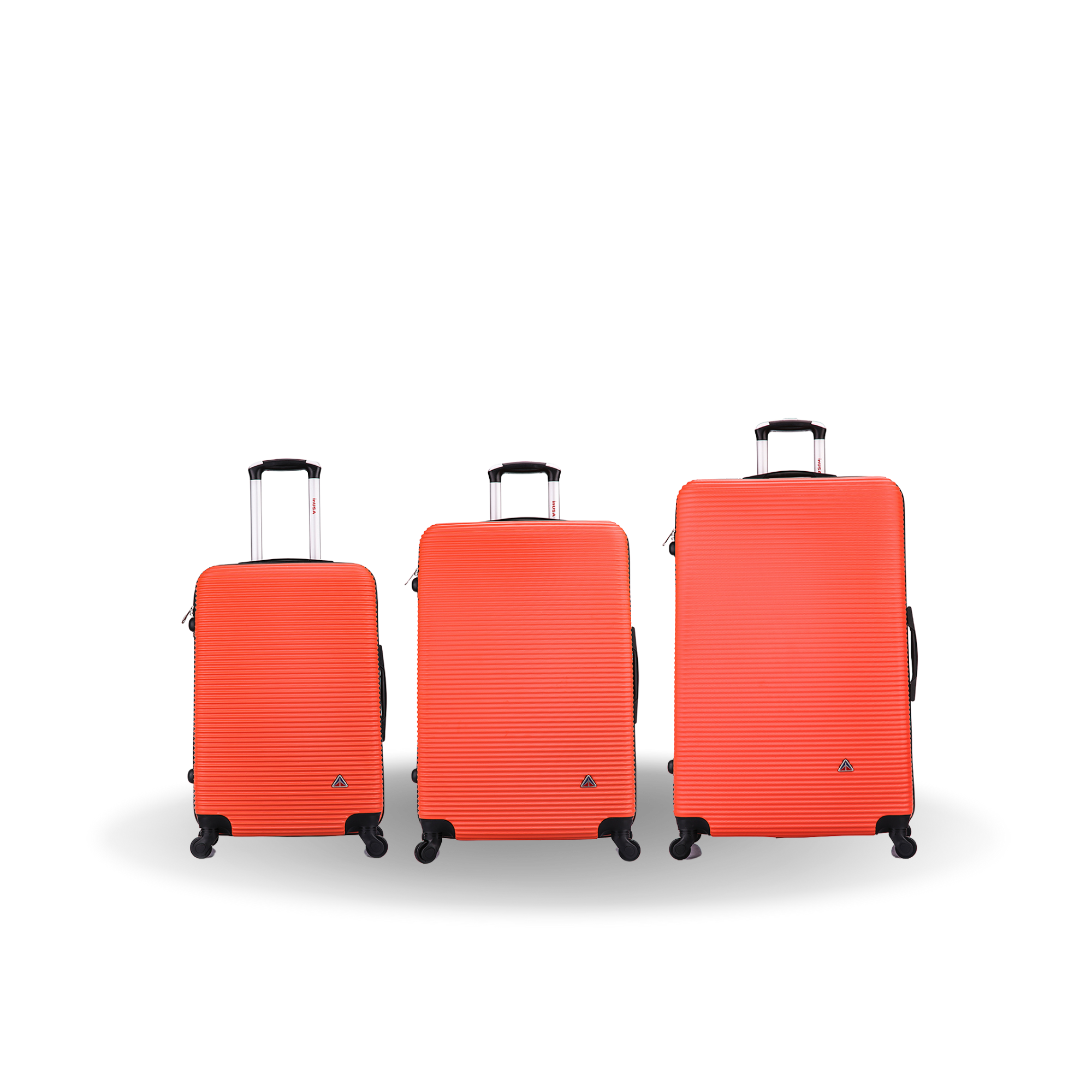 Three red suitcases of different sizes on a white background