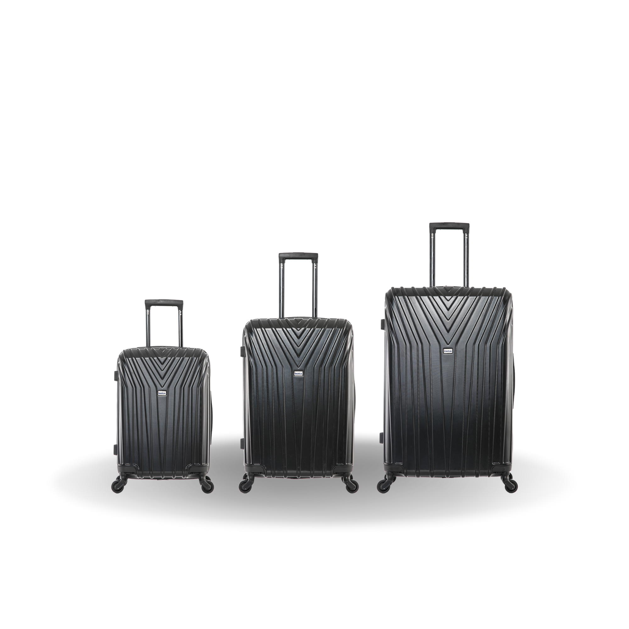 Three black suitcases of different sizes on a white background