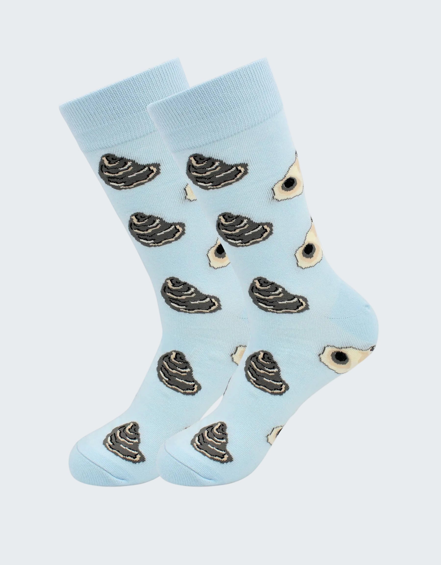 Light blue socks with black and white pattern on a white background