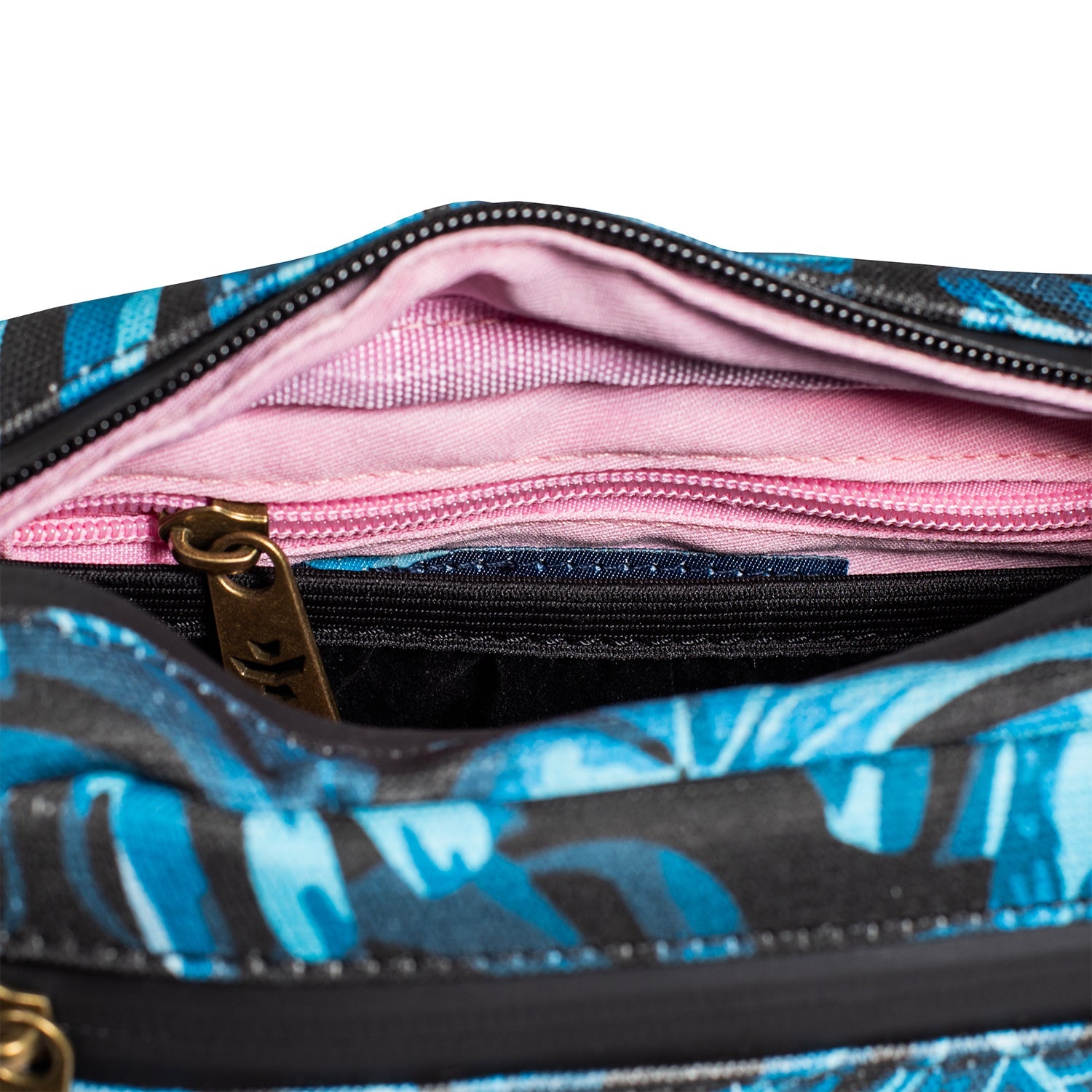 Close-up of a blue and black patterned bag with a pink interior