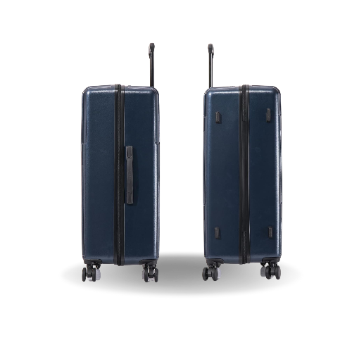 Two navy blue suitcases with black handles on a white background