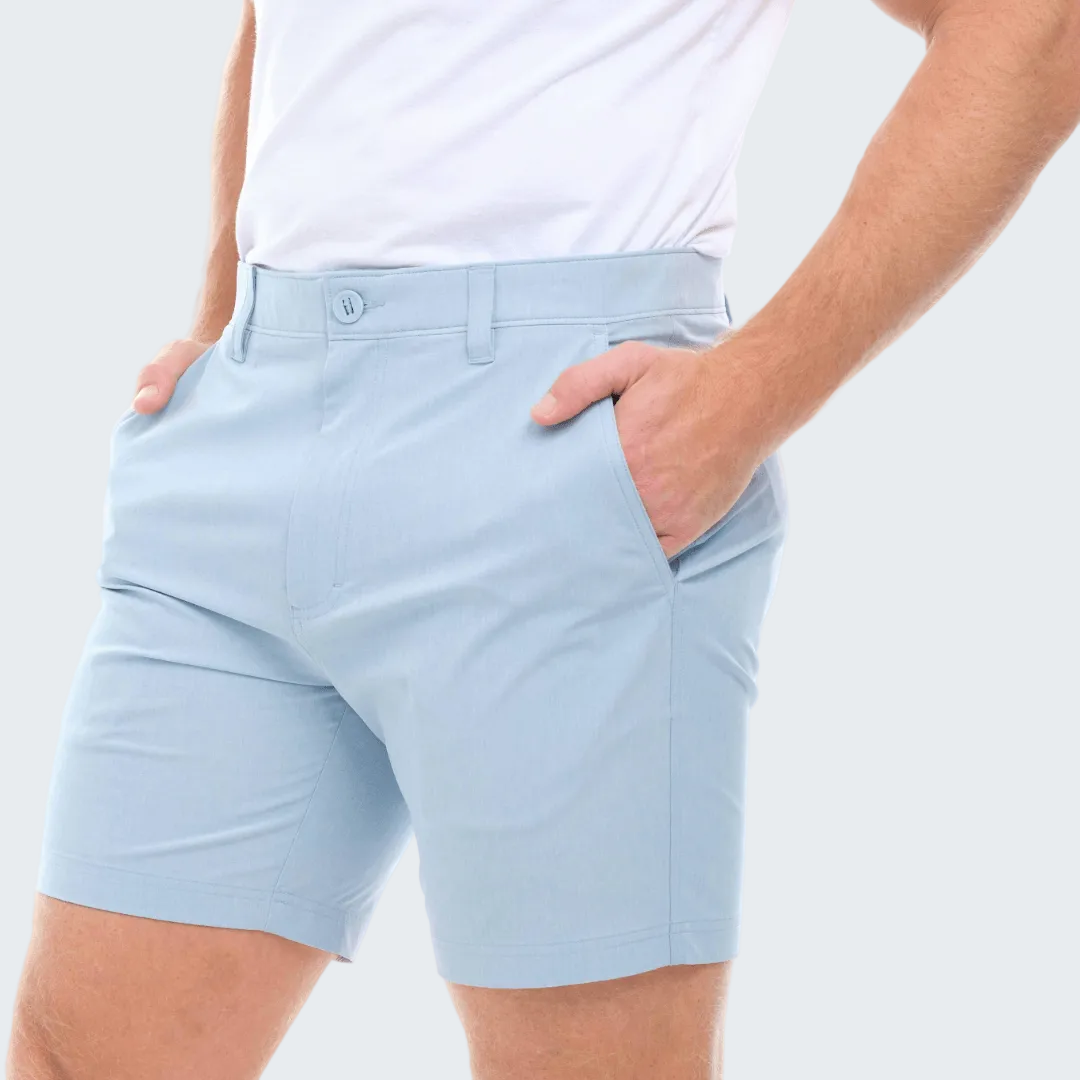Light blue shorts worn by a person on a white background
