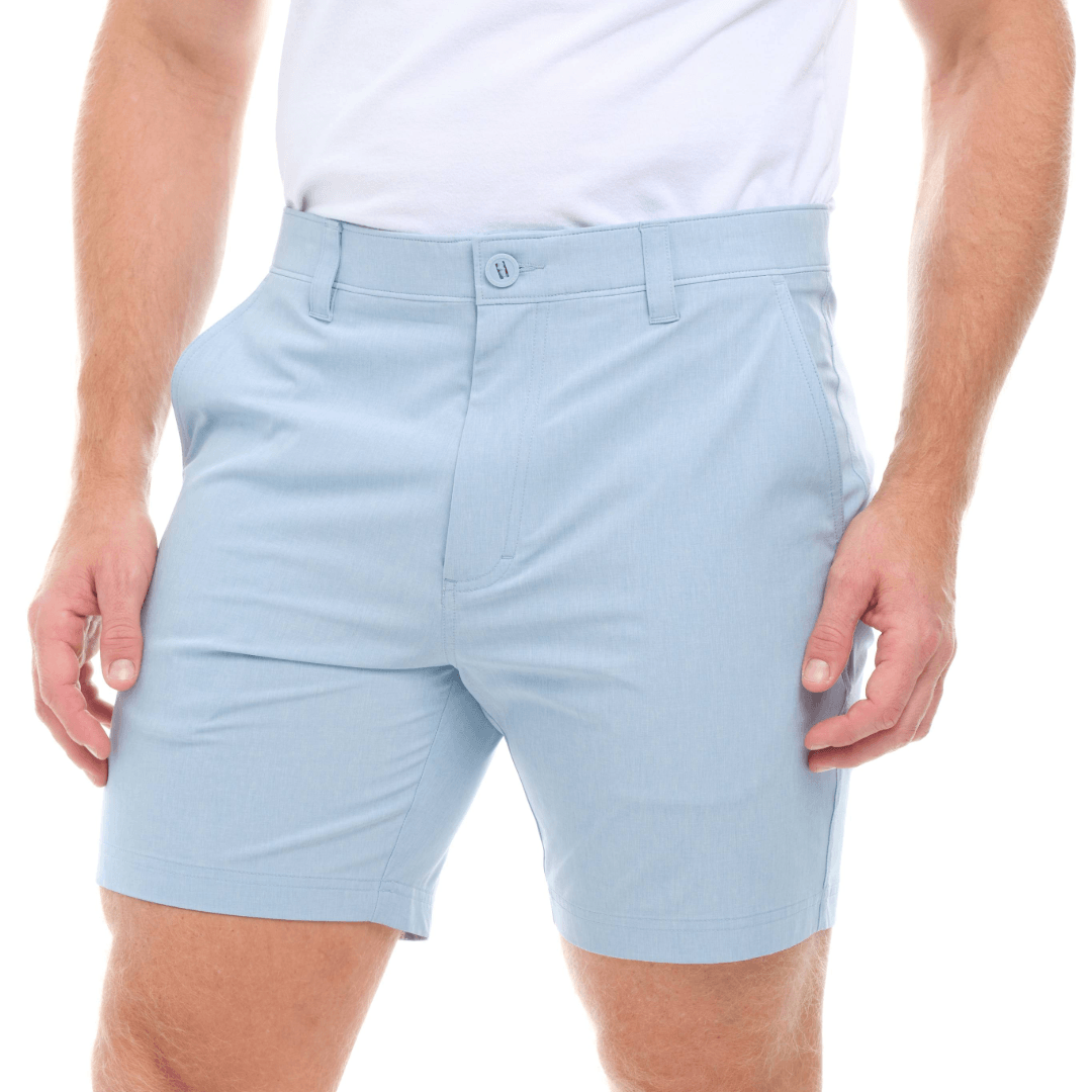 Light blue shorts worn by a person on a white background