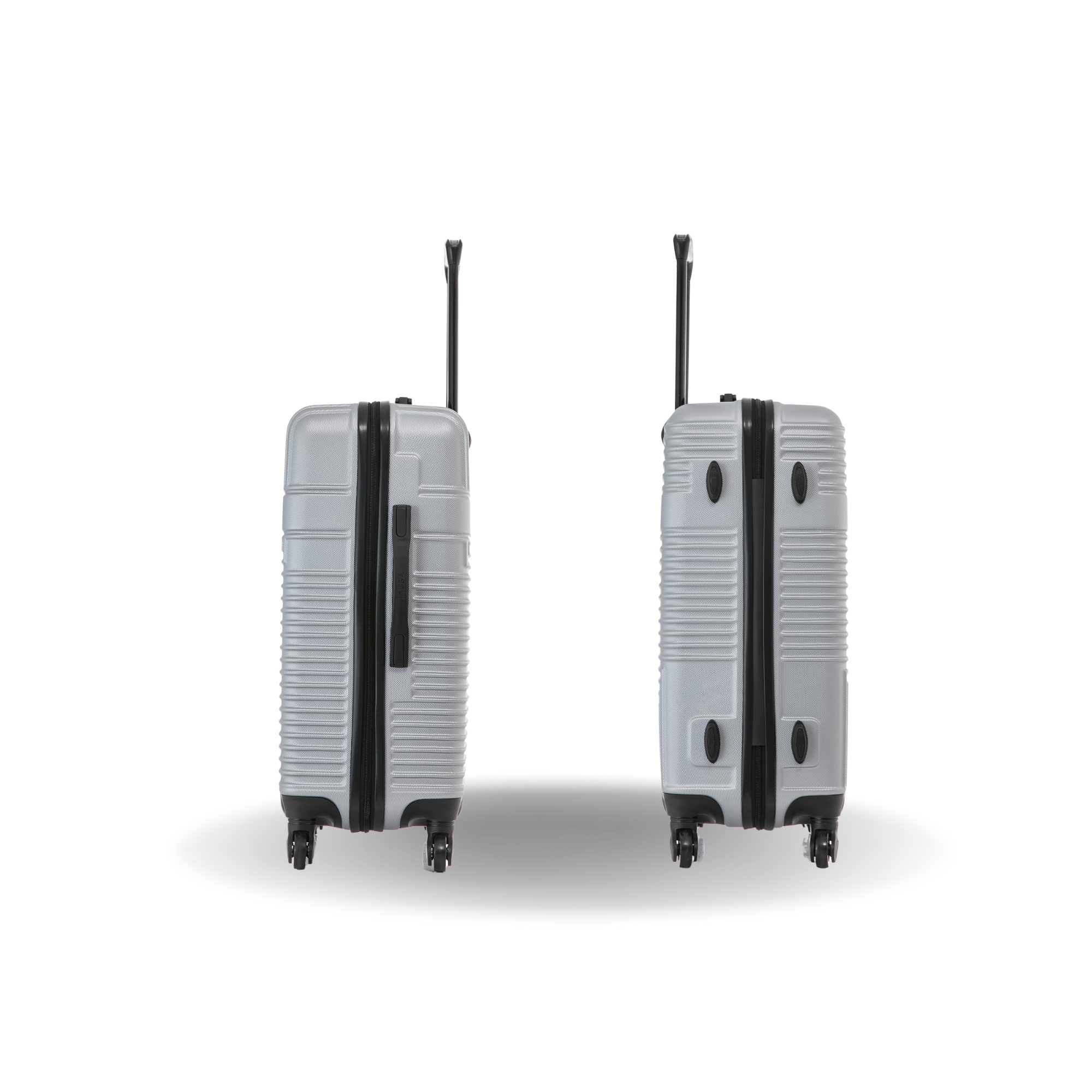 Two gray suitcases with black accents on a white background