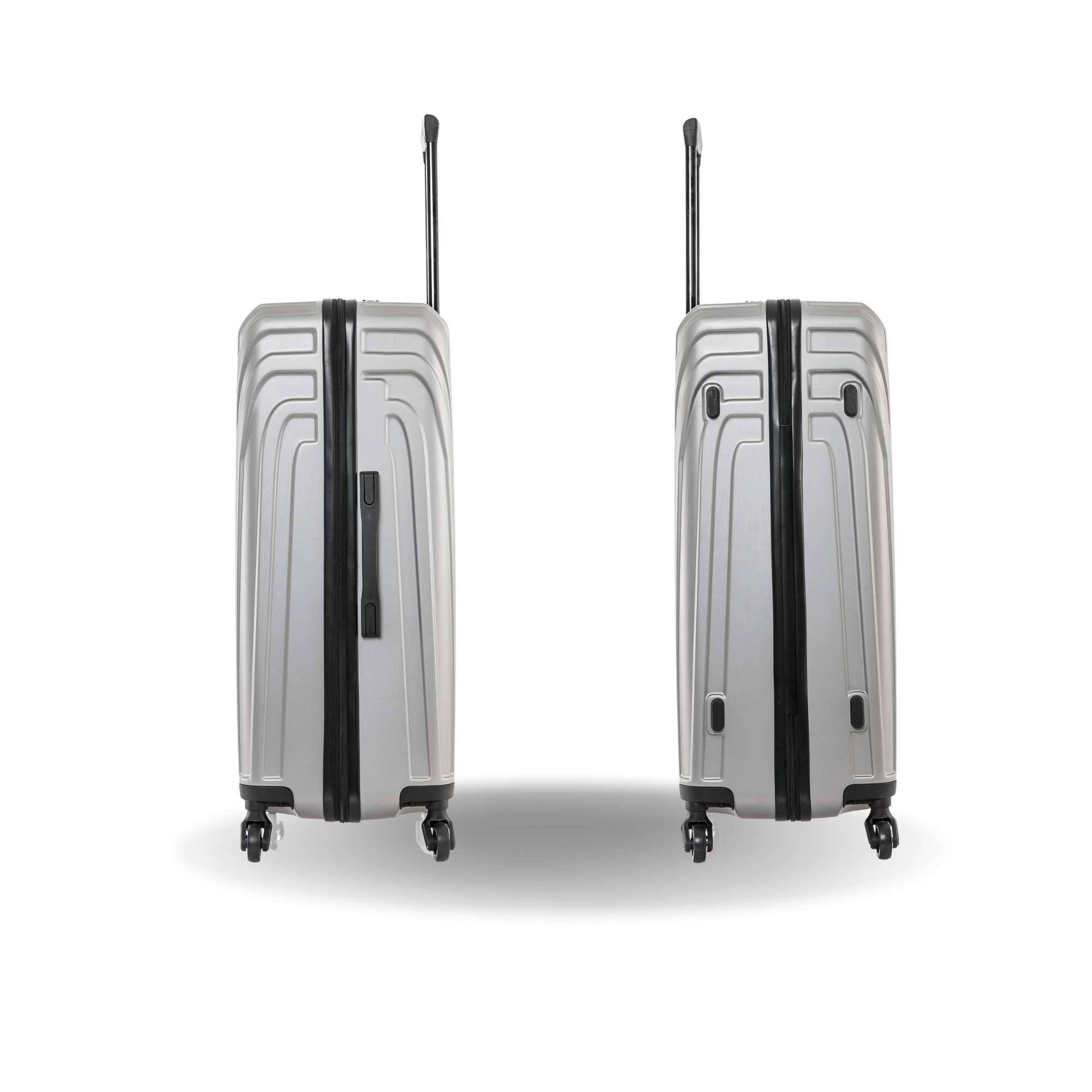 Two silver suitcases with black accents on a white background