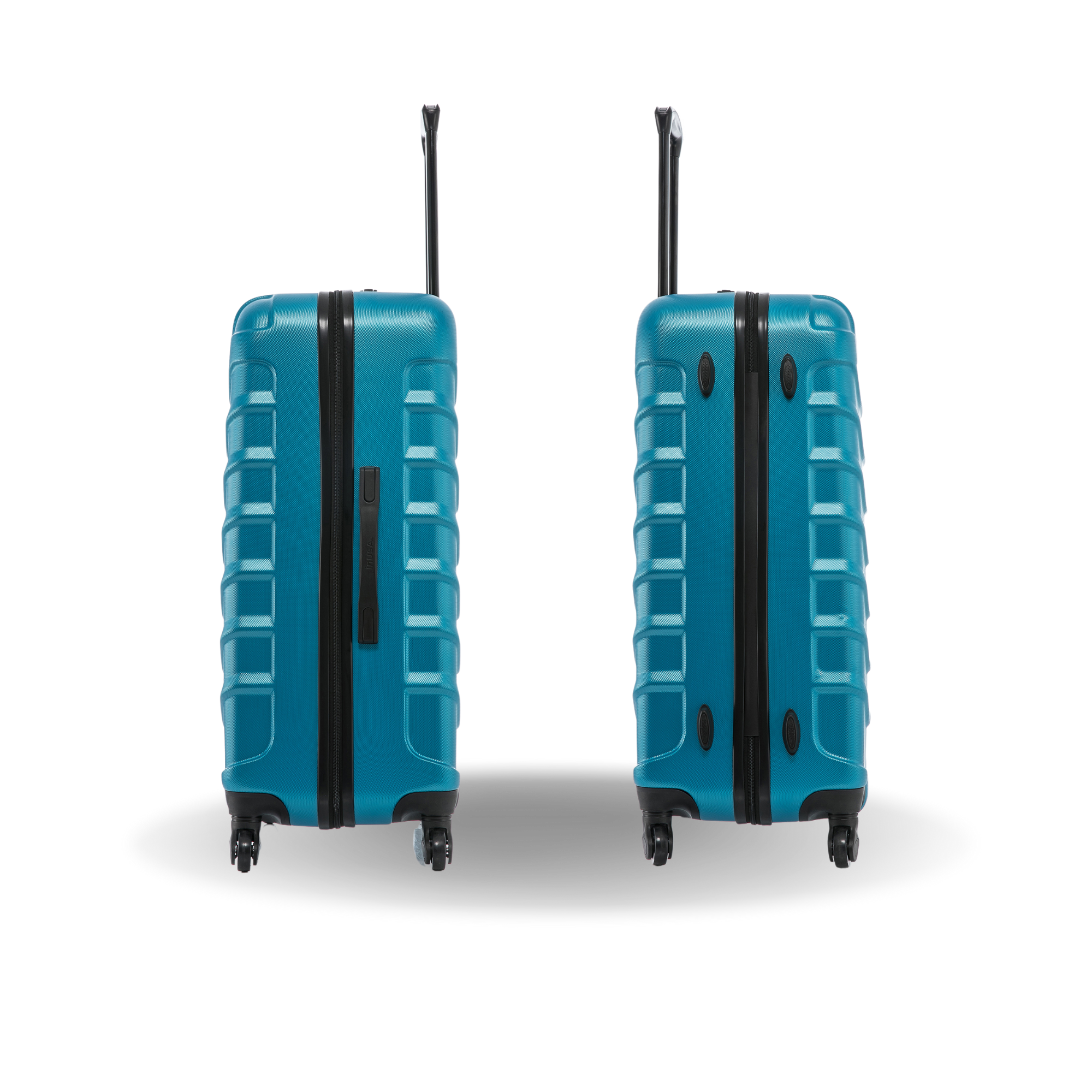 Two blue suitcases with textured surface and wheels on a white background