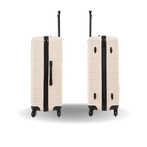 Two beige suitcases with black accents on a white background