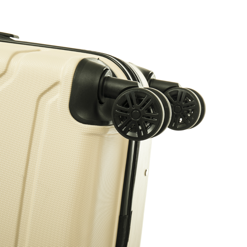 Close-up of a beige suitcase with black wheels on a white background