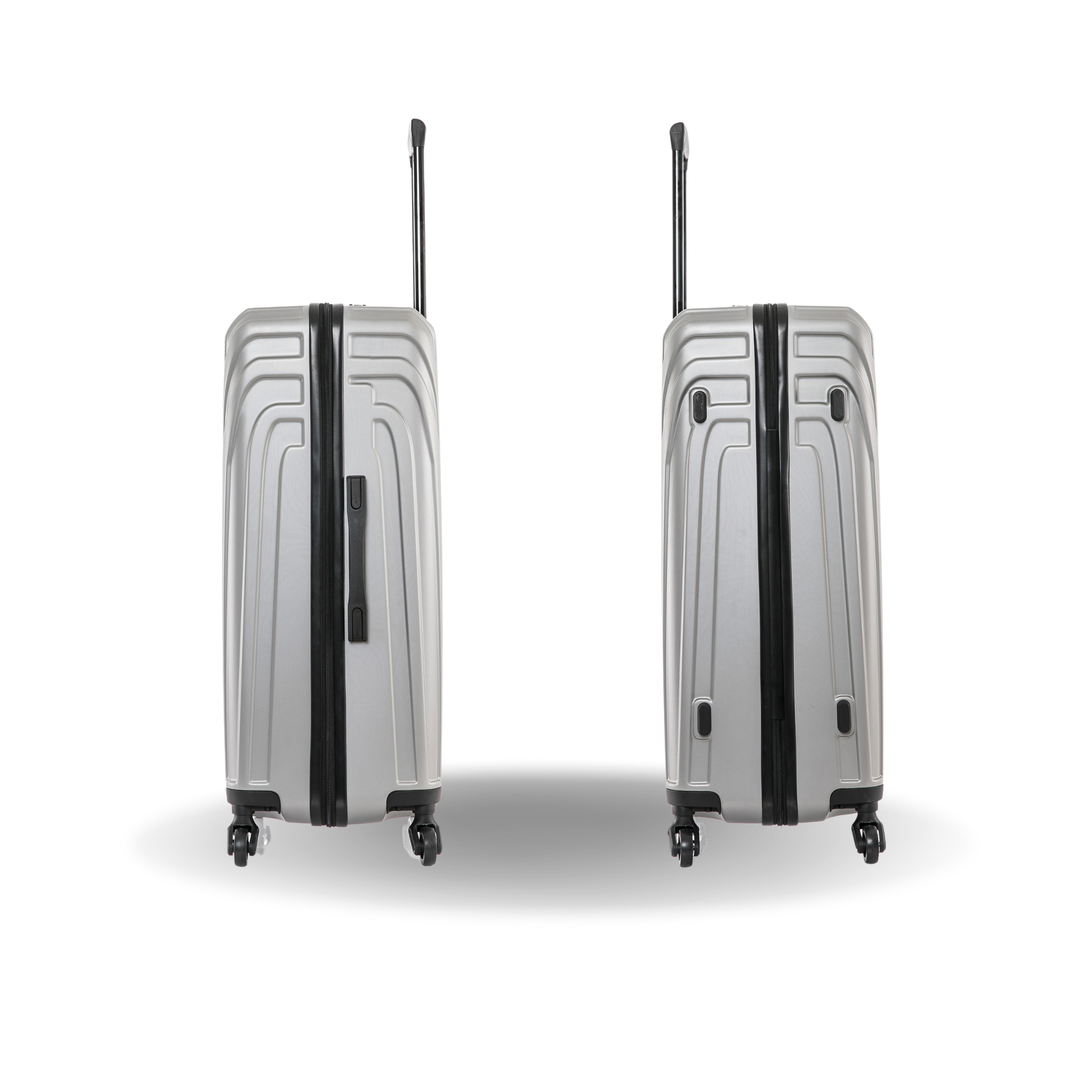 Two silver suitcases with black accents on a white background