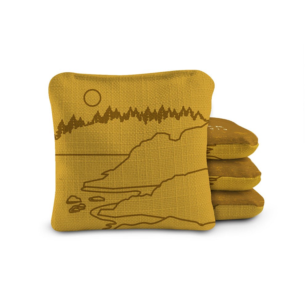 Yellow bean bags with nature design on a white background