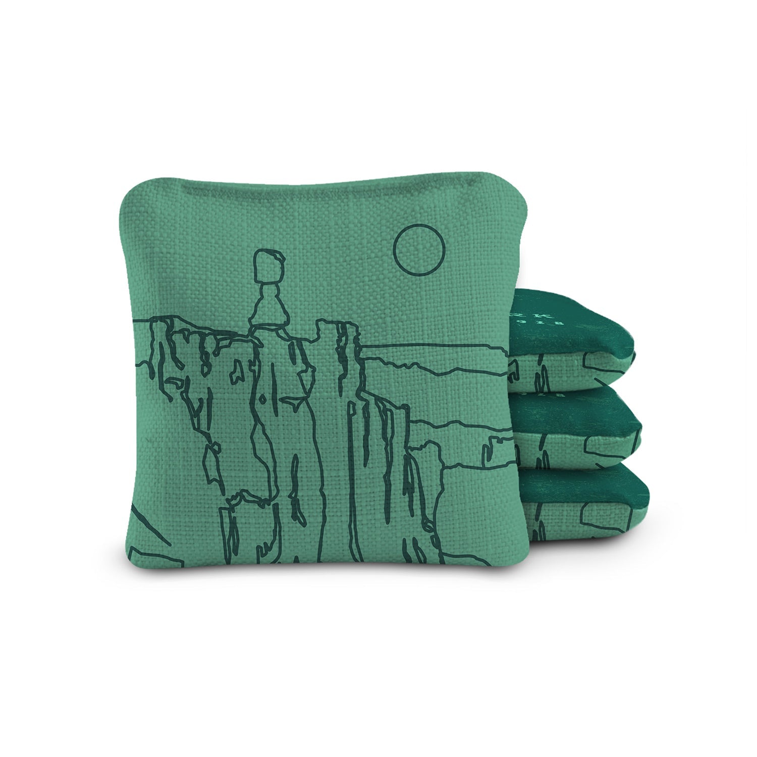 Green bean bags with mountain design on a white background